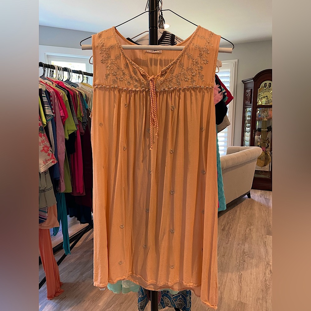 Tribe dress or tunic. Lightweight peach color.